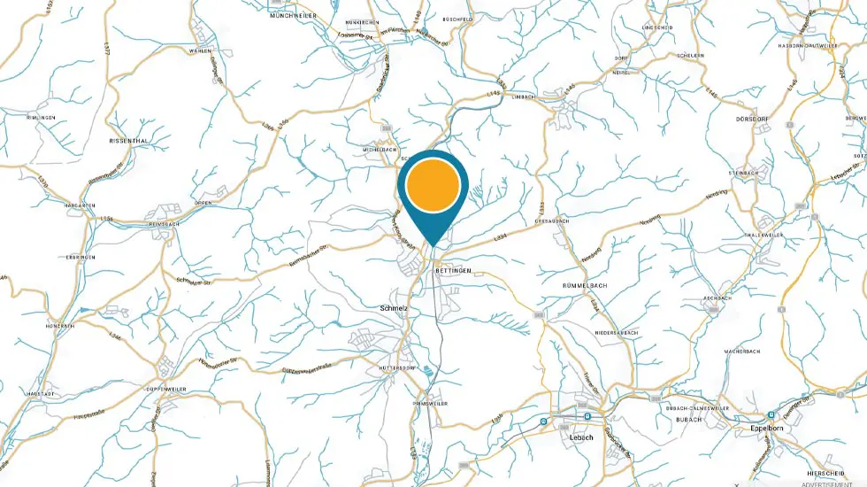 Landkarte mit Flüssen, Straßen und einem orangefarbenen Standortmarker in der Mitte